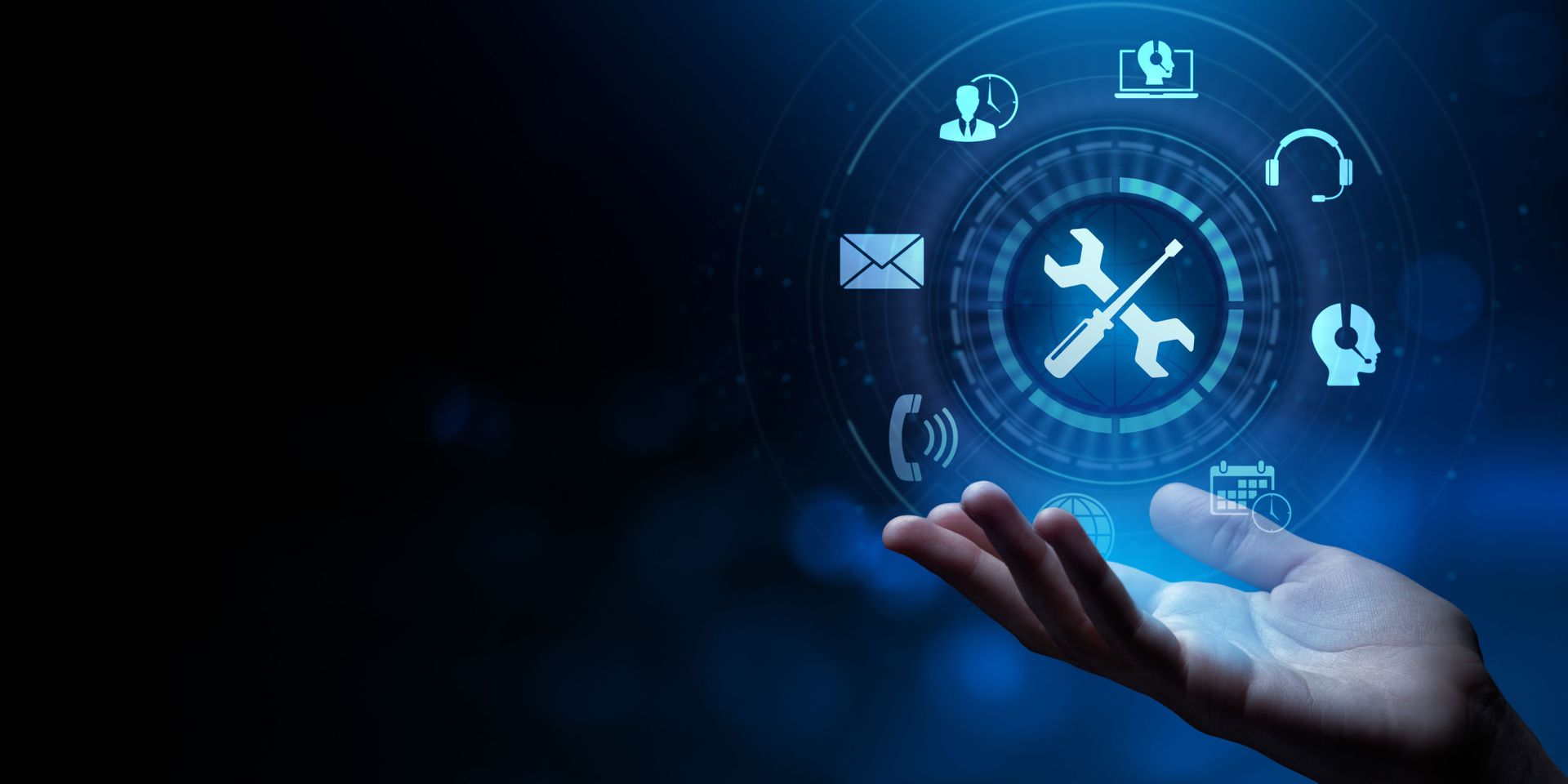 A hand reaching out toward floating icons representing tools and support services, including a wrench, headset, email, and calendar, all set against a dark, blue background.