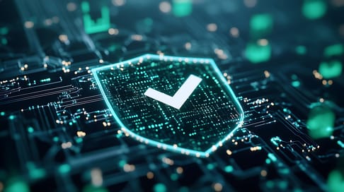 A glowing shield with a check mark at its center, set against a backdrop of digital circuitry and green data elements, symbolizing security and verification in technology.