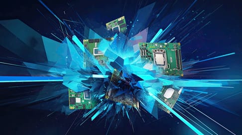 A dynamic composition featuring computer circuit boards emerging from a central explosion of blue geometric shapes and light, set against a dark background.