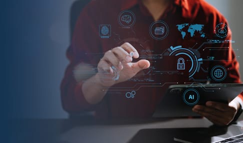 A person in a red shirt interacts with a digital tablet, surrounded by holographic icons representing technology and security, including a lock, a globe, and artificial intelligence symbols.