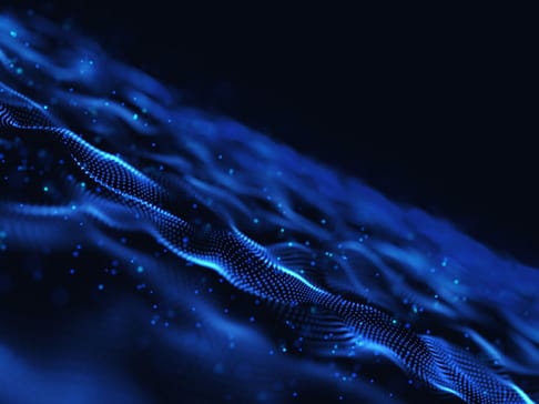Abstrakte Darstellung von blauen Wellen und digitalem Rauschen, die Bewegung und Tiefe vermitteln.