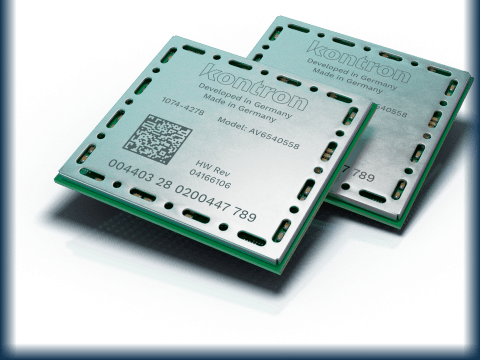 Two electronic circuit boards labeled "kontron" with text indicating they are developed in Germany. Each board has a model number (AV654055S) and a QR code. The boards are arranged on a blue reflective surface.